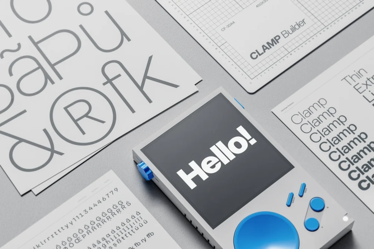 A 3D rendered device displaying "Hello!" on a dark screen, surrounded by design sketches and typography samples with blue accents