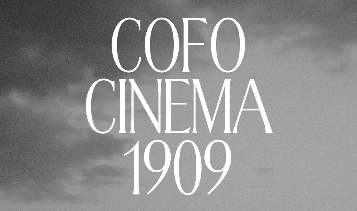 White text reading "COFO CINEMA 1909" overlaid on a stormy grey sky